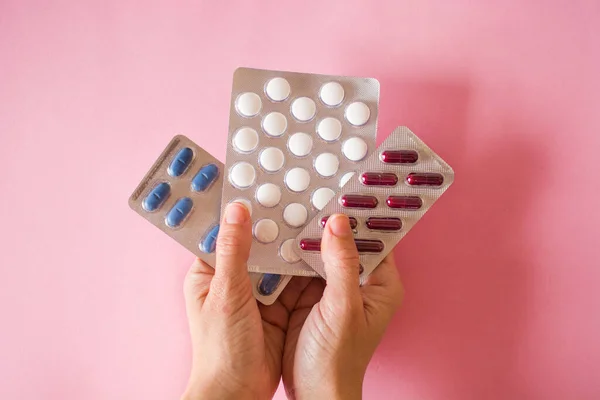Female Hand Holding Medical Pills Pink Background — Stock Photo, Image