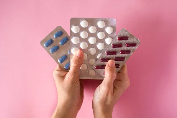 Female Hand Holding Medical Pills Pink Background — Stock Photo, Image