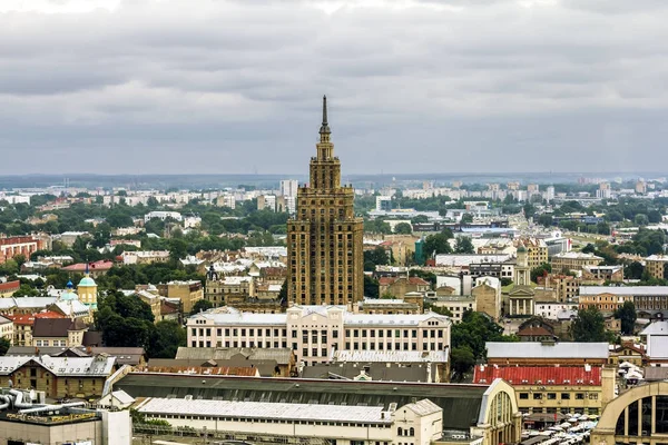 View over the rooftops of the city and the building of the Acade — Stock Photo, Image