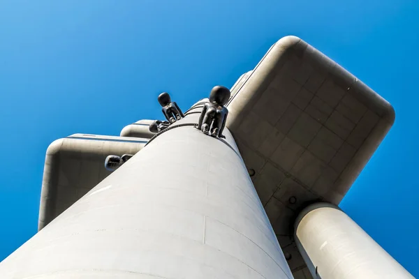 Sculptors artist David Black on Zizkov TV tower in Prague. — Stock Photo, Image