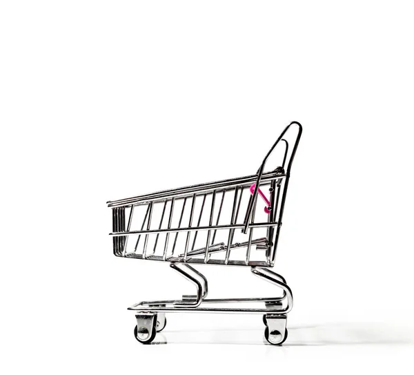 Miniature grocery cart on a white backgroun — ストック写真