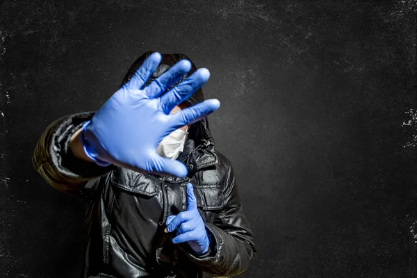 Man Medical Mask Holds Hand Medical Glove Front His Face — Stock Photo, Image