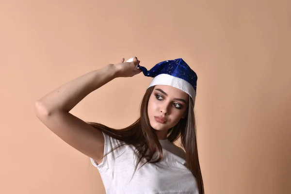 Beautiful female model wear santa hat. girl in santa hat