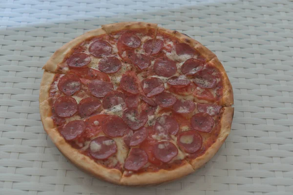 tomatoes pizza on table - Italian food style