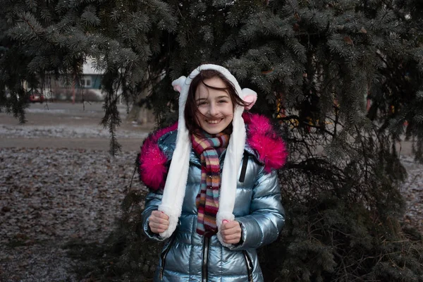 Cute little girl in hood with ears. girl in a hat bunny street — 스톡 사진