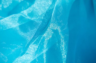 Arkaplan olarak kullanılan açık mavi doku. Mavi açık kumaş dokusu