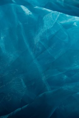 Arkaplan olarak kullanılan açık mavi doku. Mavi açık kumaş dokusu