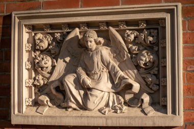 Stone statue of an angel on a german graveyard in Berlin