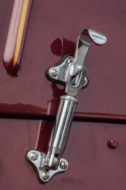 Welfenallee, Berlin, Germany - june 16, 2018: fastening luggage compartment on a vintage Jaguar at the annual Oldtimer car meeting in Frohnau