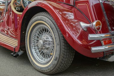 Welfenallee, Berlin, Germany - june 16, 2018: Details of a red Jaguar Oldtimer at the Vintage car meeting in Berlin