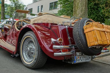 Welfenallee, Berlin, Germany - june 16, 2018: Details of a red Jaguar Oldtimer at the Vintage car meeting in Berlin
