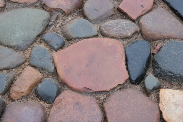 石畳の道だ多色の石畳のテクスチャ。現代の道路 — ストック写真