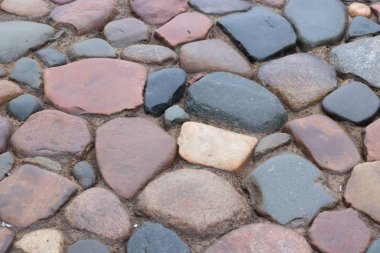Çakıl taşı yolu. Renkli parke taş dokusu. modern yol