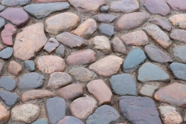ロマンチックな石畳の舗装道路の背景ブロックレンガ 多色の石畳のテクスチャ抽象的 背景には — ストック写真