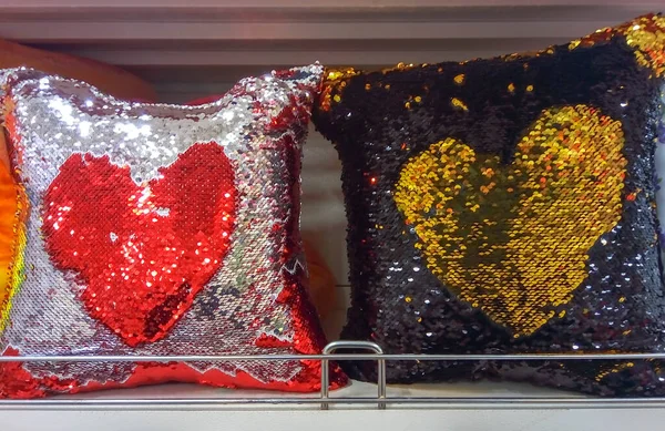 Pillows with sequins. Silver and golden pillows