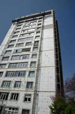 Yenileme işçiler bir blok üzerinde