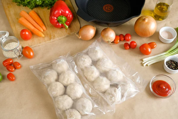 semi-finished products. the process of making frozen chicken meatballs. top view. flatlay