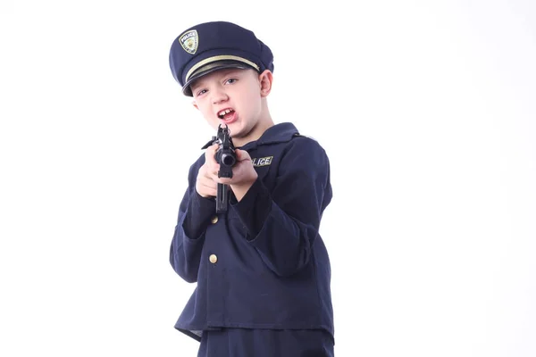 Молодий хлопчик як поліцейський . — стокове фото