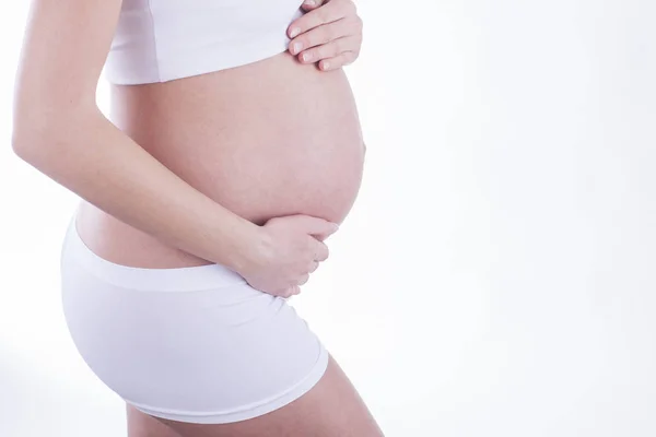 Das Bild Von Babybauch Isoliert Auf Rosa Hintergrund Das Glück — Stockfoto