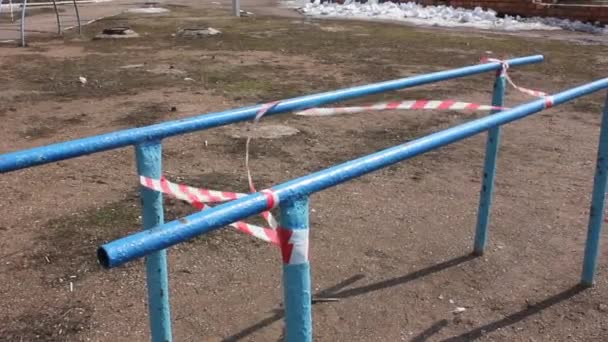 Special tape fenced playgrounds, cordoned off park — Stock Video