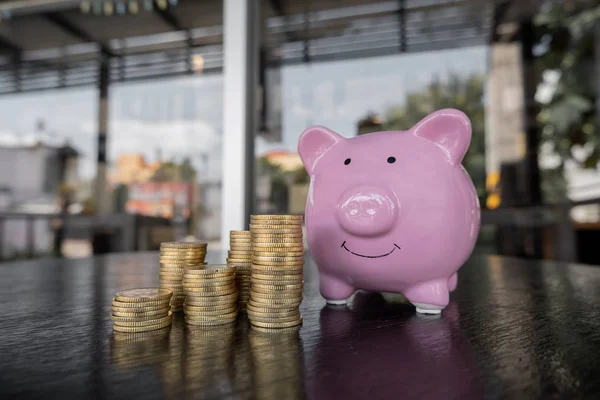 Pink piggy bank with coin pile, step up growing business to success and saving for retirement  concept — Stock Photo, Image