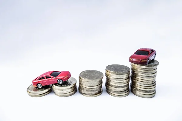 Toy cars with gold coins show To growth, saving money for car loans — Stock Photo, Image