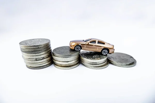 Toy cars with gold coins show To growth, saving money for car loans — Stock Photo, Image