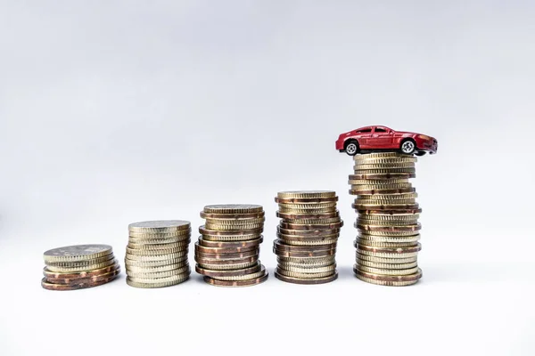 Toy cars with gold coins show To growth, saving money for car loans — Stock Photo, Image