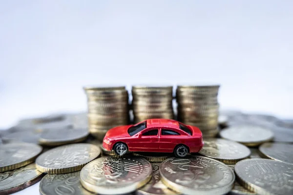 Toy cars with gold coins show To growth, saving money for car loans — Stock Photo, Image