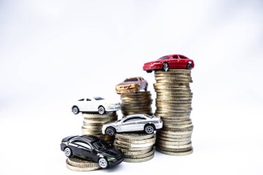 Toy cars with gold coins show To growth, saving money for car loans clipart