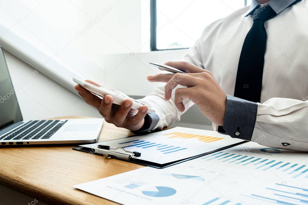 business leader woman analyzing the charts and graphs for planning management new project