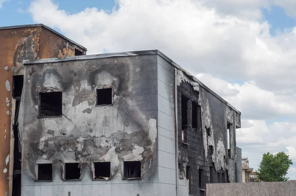 house ruin in a sunny day after a fire