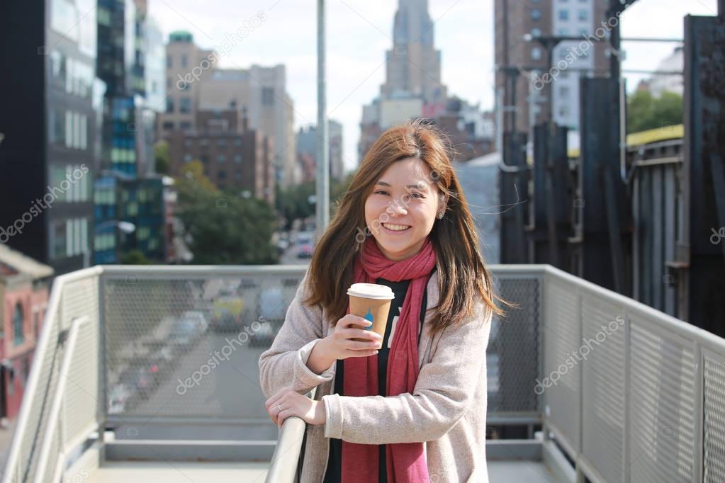 girl have a coffee in new york city