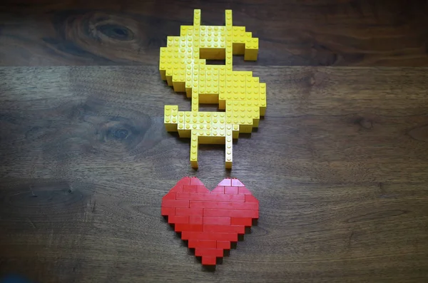 Nos sinal de dólar e forma do coração — Fotografia de Stock