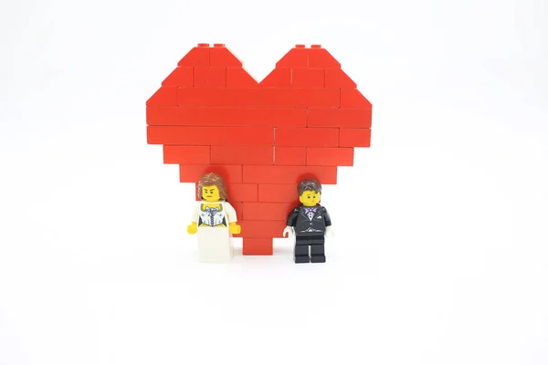 Lego heart and people — стоковое фото