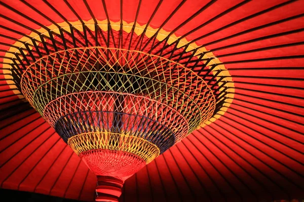 Opening red handmade paper umbrella in japan culture — Stock Photo, Image