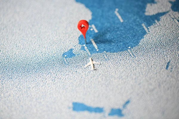 painted map with the pin and plane in Australia map