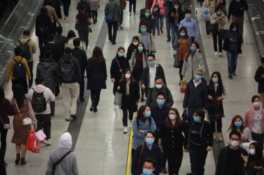 Hong Kong - 3 Feberary 2020: people wears mask after china confirm 302 death case in coronavirus outbreak. after wuhan coronavirus outbreak in china, mask supply are shortage in hong kong.