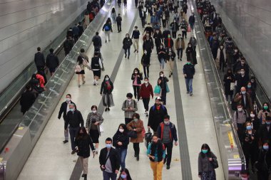Hong Kong - 3 Feberary 2020: people wears mask after china confirm 302 death case in coronavirus outbreak. after wuhan coronavirus outbreak in china, mask supply are shortage in hong kong.