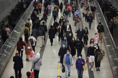 Hong Kong - 3 Feberary 2020: people wears mask after china confirm 302 death case in coronavirus outbreak. after wuhan coronavirus outbreak in china, mask supply are shortage in hong kong.