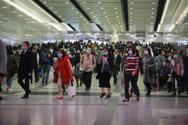 Hong Kong - 3 Feberary 2020: people wears mask after china confirm 302 death case in coronavirus outbreak. after wuhan coronavirus outbreak in china, mask supply are shortage in hong kong.