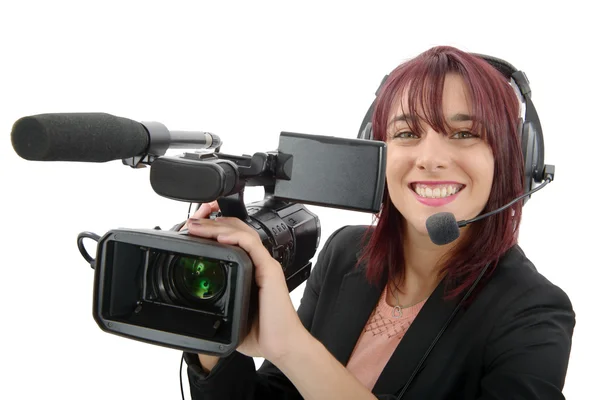 Jovem com uma câmera de vídeo profissional — Fotografia de Stock