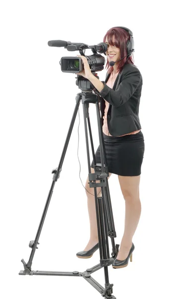 Jeune femme avec une caméra vidéo professionnelle — Photo
