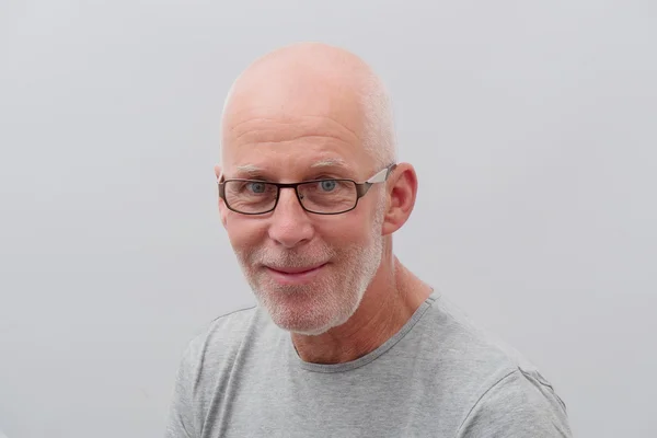 Portrait of a mature man with glasses — Stock Photo, Image