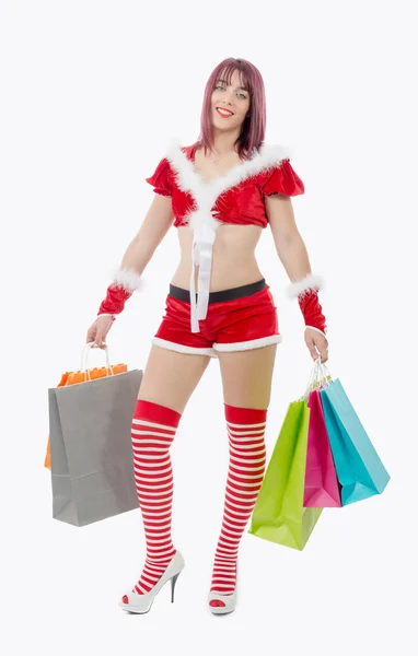 Bella donna Babbo Natale in possesso di borse della spesa — Foto Stock