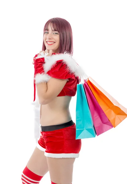 Linda Papai Noel mulher segurando sacos de compras — Fotografia de Stock