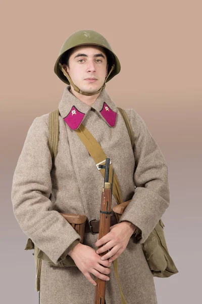 Young Soviet soldier with winter uniform — Stock Photo, Image