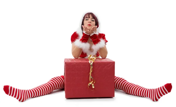 Menina bonita vestida como Papai Noel no chão — Fotografia de Stock