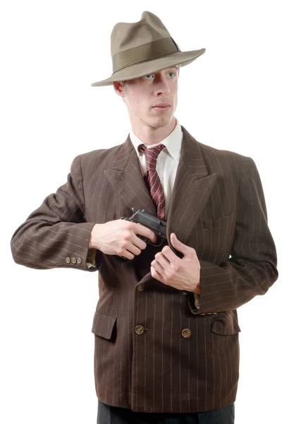 Гангстер в винтажном костюме, с пистолетом — стоковое фото