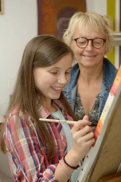 先生の絵画若い十代の少女 — ストック写真